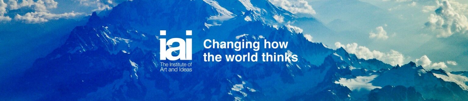 IAI logo banner with blue mountains in the background